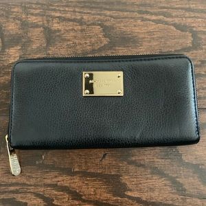 Michael Kora wallet